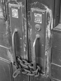 Chain on the Soo Line doors of the closed Duluth Union Station on July 27, 1966. Photograph by Wallace W. Abbey, © 2015, Center for Railroad Photography and Art. Abbey-06-058-02
