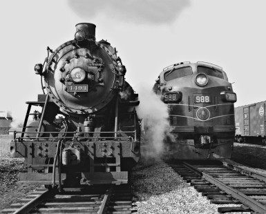 Baltimore and Ohio Railroad 2-8-2 steam locomotive helper and lead diesel locomotive at yard in Dayton, Ohio, ready to couple for eastbound run to Washington Court House on March 24, 1956. Photograph by J. Parker Lamb, © 2015, Center for Railroad Photography and Art. Lamb-01-004-08