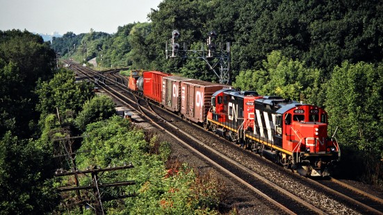Eastbound Canadian National Railway freight train in Bayview, Ontario, on August 18, 1992. Photograph by John F. Bjorklund, © 2015, Center for Railroad Photography and Art. Bjorklund-23-02-05