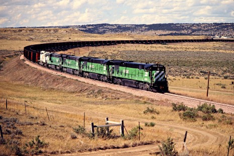Eastbound Burlington Northern Railroad coal train in Owens, Wyoming, on July 15, 1980. Photograph by John F. Bjorklund, © 2015, Center for Railroad Photography and Art. Bjorklund-11-24-21