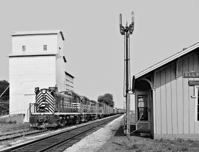 Peoria-bound Nickel Plate Road freight train pulls past unmanned station at Ellsworth, Illinois, on August 9, 1959. Photograph by J. Parker Lamb, © 2015, Center for Railroad Photography and Art. Lamb-01-059-07