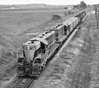 Eastbound Toledo, Peoria and Western Railway local passes wye at El Paso, Illinois, (Illinois Central Railroad connection) in October, 1960. Photograph by J. Parker Lamb, © 2015, Center for Railroad Photography and Art. Lamb-01-065-06