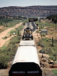 Eastbound and westbound Santa Fe Railway freight trains meeting at Scholle, New Mexico,  on May 6, 1986. Photograph by John F. Bjorklund, © 2015, Center for Railroad Photography and Art. Bjorklund-05-07-06