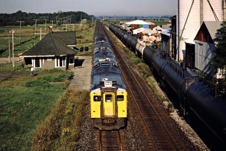 Eastbound VIA Rail passenger train with RDC equipment on the Canadian National Railway in Watford, Ontario, on August 30, 1986. Photograph by John F. Bjorklund, © 2015, Center for Railroad Photography and Art. Bjorklund-22-13-02