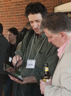 Oren Helbok (left) and Matthew Malkiewicz at Saturday's reception. Center for Railroad Photography and Art. Photograph by Henry A. Koshollek