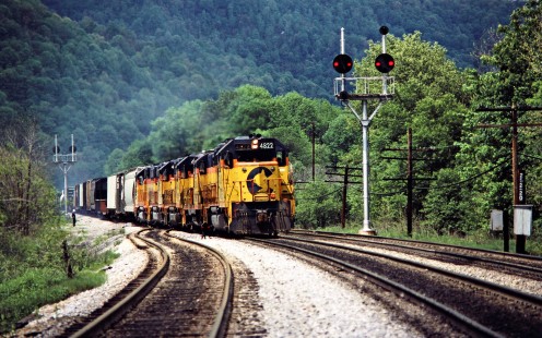 Westbound Baltimore and Ohio Railroad freight train passing the color position light signals at McMillan just east of Rowlesburg, West Virginia, on May 23, 1984. Photograph by John F. Bjorklund, © 2015, Center for Railroad Photography and Art. Bjorklund-17-05-02