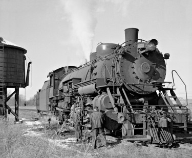 Bevier & Southern Railroad 2-8-2 steam locomotive no. 4955 at the water tank in Bevier, Missouri, on January 29, 1959. Photograph by J. Parker Lamb, © 2015, Center for Railroad Photography and Art. Lamb-01-050-01