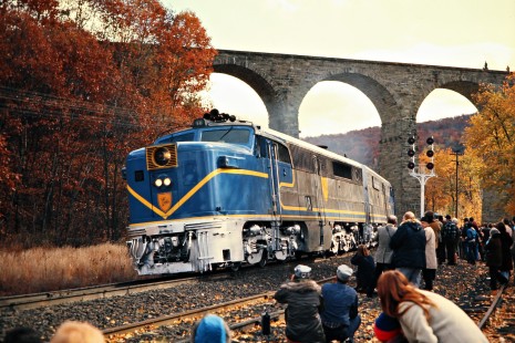 Northbound Delaware and Hudson Railway passenger excursion train under the Starrucca Viaduct in Lanesboro, Pennsylvania, on October 19, 1974. Photograph by John F. Bjorklund, © 2015, Center for Railroad Photography and Art. Bjorklund-18-15-23