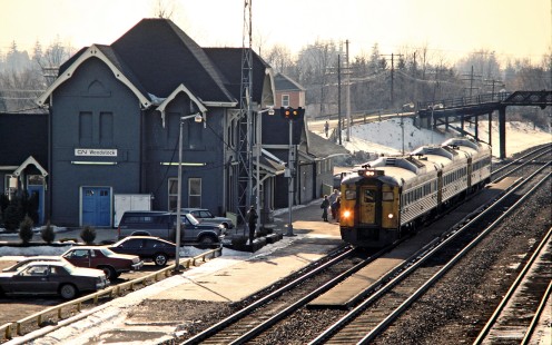 Eastbound VIA Rail passenger train with RDCs on the Canadian National Railway in Woodstock, Ontario, on March 5, 1988. Photograph by John F. Bjorklund, © 2015, Center for Railroad Photography and Art. Bjorklund-22-24-21