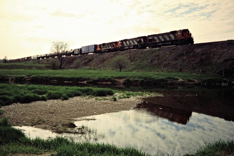 Eastbound Canadian National Railway freight train in Banner, Ontario, on April 27, 1985. Photograph by John F. Bjorklund, © 2015, Center for Railroad Photography and Art. Bjorklund-21-22-21