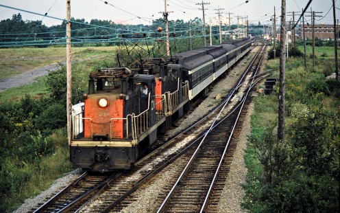 Eastbound Canadian National Railway passenger train led by two boxcab electrics in Montreal, Quebec, on August 18, 1986. Photograph by John F. Bjorklund, © 2015, Center for Railroad Photography and Art. Bjorklund-22-04-13