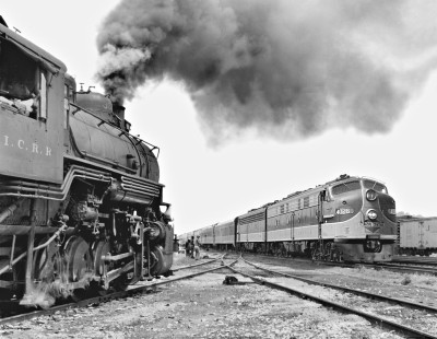 Illinois Central Railroad steam locomotive and diesel-powered southbound <i>City of New Orleans</i> passenger train at Centralia, Illinois, on August 9, 1958. Photograph by J. Parker Lamb, © 2015, Center for Railroad Photography and Art. Lamb-01-035-06