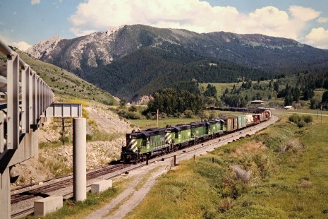Burlington Northern Railroad freight train at the I-90 bridge in Bozeman, Montana, on July 8, 1973. Photograph by John F. Bjorklund, © 2015, Center for Railroad Photography and Art. Bjorklund-07-27-08