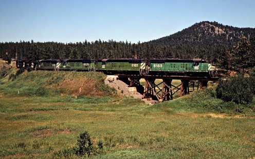 Southbound Burlington Northern Railroad freight train in Redfern, South Dakota, on July 16, 1980. Photograph by John F. Bjorklund, © 2015, Center for Railroad Photography and Art. Bjorklund-11-28-19