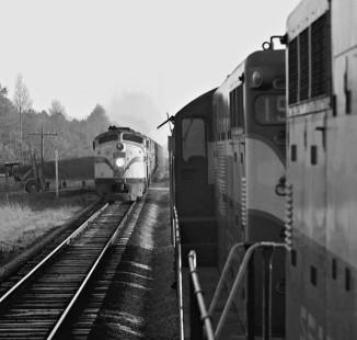 Northbound Seaboard Air Line Railroad train no. 82 passes mail-express train no. 5 near Henderson, North Carolina, on February 1, 1962. Photograph by J. Parker Lamb, © 2016, Center for Railroad Photography and Art. Lamb-01-081-02