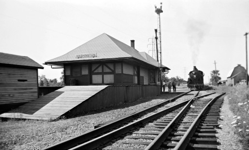 Grand Trunk Western Railroad train no. 44 at Washington , Michigan, circa 1940. Photograph by Robert Hadley; Hadley-03-145-03.JPG; © 2016, Center for Railroad Photography and Art