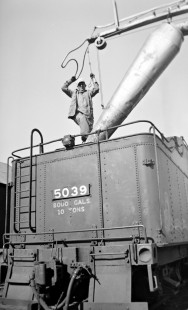 Grand Trunk Western Railroad worker at Richmond, Michigan, circa 1940. Photograph by Robert Hadley; Hadley-04-107-03.JPG; © 2016, Center for Railroad Photography and Art