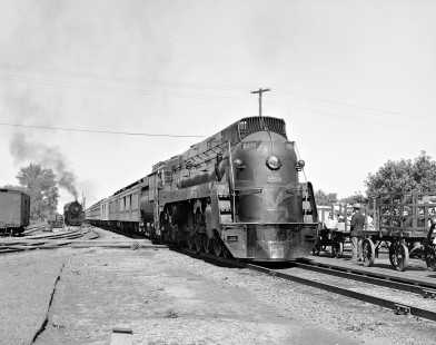 Grand Trunk Western Railroad steam locomotive no. 6409 leads passenger train at Durand, Michigan in 1942. Photograph by Robert Hadley.; Hadley-03-102-01.JPG; © 2016, Center for Railroad Photography and Art