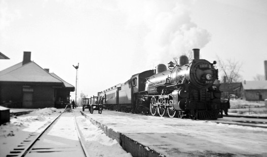 Steam locomotive no. 5037 leads passenger train at Pontiac, Michigan, circa 1940. Photograph by Robert Hadley.; Hadley-03-100-02.JPG; © 2016, Center for Railroad Photography and Art