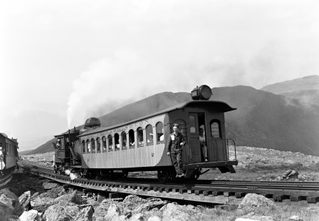 Taken by Furler on August 7, 1949, this image shows the 0-2-2-0 Mount Washington Cog Railway steam locomotive "Tip Top" pushing a wooden passenger car up Mount Washington in New Hampshire. Photograph by Donald W. Furler. Furler-22-114-01; © 2017, Center for Railroad Photography and Art