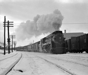 Grand Trunk Western Railroad steam locomotive no. 6407 leads westbound passenger train, the "Maple Leaf," at Durand, Michigan, in 1946. Photograph by Robert Hadley. Hadley-01-001-05; © 2016, Center for Railroad Photography and Art