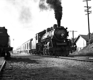 Grand Trunk Western Railroad steam locomotive no. 5031 departs Durand, Michigan, with "Intercity Limited" circa 1940. Photograph by Robert Hadley, Hadley-01-001-04; © 2016, Center for Railroad Photography and Art