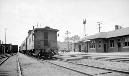 Grand Trunk Western Railroad passenger train at depot in Imlay City, Michigan, circa 1940. Photograph by Robert Hadley Hadley-05-010-04.JPG; © 2017, Center for Railroad Photography and Art