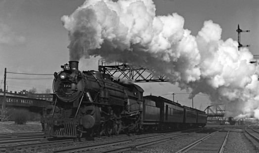 Reading Company, 4-6-2, steam locomotive no. 105, pulling westbound "Philadelphia Express" passenger train past Communipaw Avenue at Jersey City, New Jersey, in 1939. Photograph by Donald W. Furler,  © 2017, Center for Railroad Photography and Art, Furler-24-098-03