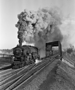 Erie Railroad 2-8-4 steam locomotive no. 3384 pulling a westbound freight train with 60 cars at Campbell Hall, New York, on March 3, 1946. Train no. 89 with locomotive no. 3363 followed immediately behind this one. Photograph by Donald W. Furler, © 2017, Center for Railroad Photography and Art, Furler-11-069-01