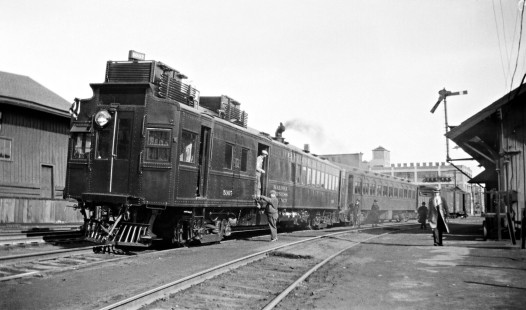 Erie Railroad gas-electric car no. 5007 leading a two-car passenger train at Newark, New Jersey, circa 1930s. Photograph by Donald W. Furler, © 2017, Center for Railroad Photography and Art, Furler-23-002-02