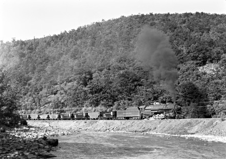Reading Company 2-10-2 steam locomotive no. 3012 with a coal train approaches Tamaqua, Pennsylvania from the south on July 10, 1953. This view was shot from Route 309 across the Little Schuylkill River.  Photograph by Donald W. Furler, © 2017, Center for Railroad Photography and Art, Furler-16-003-02