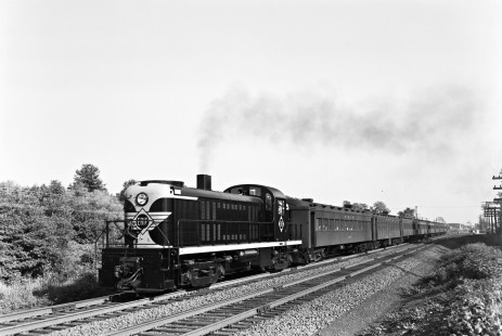Erie Railroad RS-2 diesel locomotive leading westbound passenger train at Radburn Station in Fair Lawn, New Jersey, circa 1950. Photograph by Donald W. Furler, © 2017, Center for Railroad Photography and Art, Furler-21-033-02