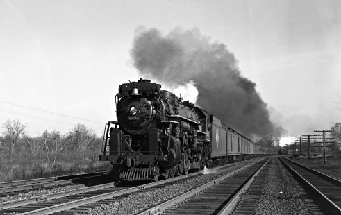 Erie Railroad 4-6-2 steam locomotive no. 2943 pulling eastbound passenger train no. 6 through Ramsey, New Jersey, on March 22, 1941. A second train is visible in the distance. Photograph by Donald W. Furler, © 2017, Center for Railroad Photography and Art, Furler-24-104-04