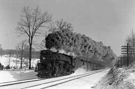 Erie Railroad 4-6-2 K-5-A steam locomotive no. 2935 kicks up snow as it travels westbound with passenger train no. 1, "The Erie Limited," at Oxford, New York, on February 23, 1946. Photograph by Donald W. Furler, © 2017, Center for Railroad Photography and Art, Furler-09-120-02