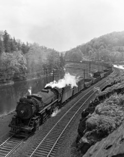 Erie Railroad 2-8-2 steam locomotives no. 3203 pulling a westbound freight train along the Ramapo River near Tuxedo, New York, on May 6, 1945. Photograph by Donald W. Furler, © 2017, Center for Railroad Photography and Art, Furler-10-065-01