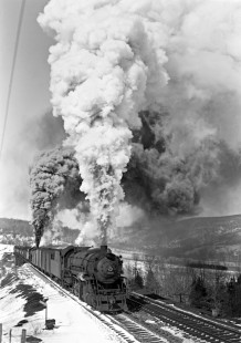 Erie Railroad 2-10-2 steam locomotive no. 4210 pulling a southbound freight train on  "Little Starrucca Viaduct" in Starrucca, Pennsylvania on March 19, 1950. Photograph by Donald W. Furler, © 2017, Center for Railroad Photography and Art, Furler-21-026-02