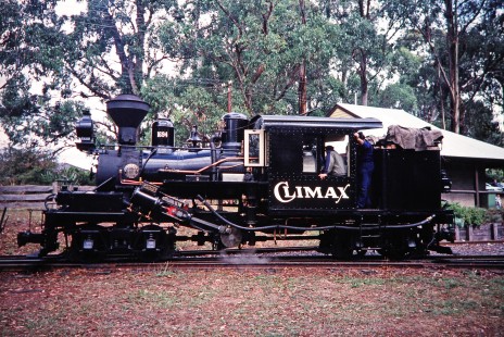 Puffing Billy Railway steam locomotive no. 1694 (built by Climax Locomotive Works) with two workers aboard in Melbourne, Victoria, Australia, on April 5, 1997. Photograph by Fred M. Springer, © 2014, Center for Railroad Photography and Art. Springer-Australia-UK-12-09