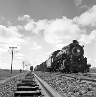 National Railways of Mexico  4-6-2 no. 2525 (shut off and drifting) catching no. 2530 in the pass north of Toluca, Mexico on the way to Acambaro on September 8, 1961. Rose-01-056-09; Photograph by Ted Rose,  © 2015, Center for Railroad Photography and Art