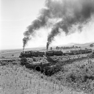 National Railways of Mexico 2-8-0 steam locomotives no. 262 and 287 moving over a bridge near Cuautla, Morelos, Mexico on August 25, 1961. Rose-01-001-02; Photograph by Ted Rose, © 2015, Center for Railroad Photography and Art