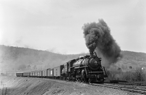 Erie Railroad 4-6-2 steam locomotive no. 2752 pulling eastbound passenger train no. 28, "The Mountain Express," at Gulf Summit, New York, in 1941. Photograph by Donald W. Furler, © 2017, Center for Railroad Photography and Art, Furler-09-060-01