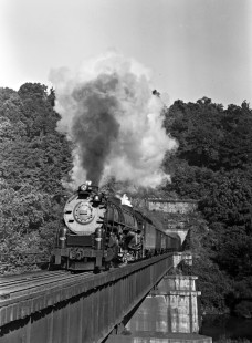 Western Maryland Railway 4-8-4 steam locomotive no. 1406 pulls an eastbound freight train through the eastern portal of the Knobley Tunnel at Carpendale, West Virginia, in 1952. Still Image; B&W negative; 5x7 inches; Furler-22-097-01; © 2017, Center for Railroad Photography and Art