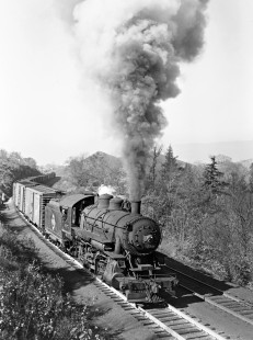 Eire Railroad 2-8-0 steam locomotive no. 1675 leads a freight train near Avoca, Pennsylvania, on October 21, 1950. Photograph by Donald W. Furler, © 2017, Center for Railroad Photography and Art, Furler-19-082-02