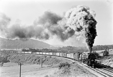 Western Maryland Railway 4-6-6-4 steam locomotive no. 1204 hauls a westbound freight train around Helmstetter's Curve near Corriganville, Maryland in August of 1952. Furler-16-007-01; © 2017, Center for Railroad Photography and Art