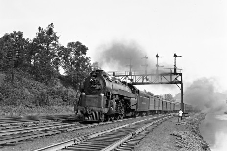 Reading Company 4-6-2 steam locomotive no. 210 pulling a westbound passenger train along the Lehigh Coal & Navigation Company canal at Allentown, Pennsylvania, on September 19, 1948. Note the second locomotive on the adjacent track in the distance. Photograph by Donald W. Furler, © 2017, Center for Railroad Photography and Art, Furler-19-007-02