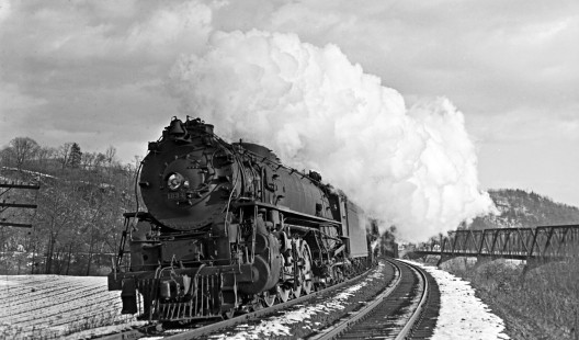 Delaware, Lackawanna and Western Railroad 4-8-4 steam locomotive no. 1634 and 4-8-2 no. 2228 crossing the Delaware River bridge near Portland, Pennsylvania, with westbound freight on January 5, 1941. Photograph by Donald Furler. Furler-24-117-02.JPG; © 2017, Center for Railroad Photography and Art