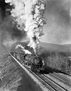 Delaware, Lackawanna and Western Railroad 4-8-2 steam locomotive no. 2228 emerges from Roseville Tunnel with eastbound freight train east of Andover, New Jersey, in 1940. Photograph by Donald Furler; Furler-03-018-04.JPG; © 2017, Center for Railroad Photography and Art
