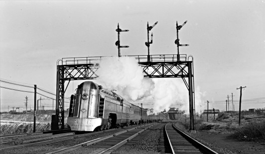 Reading Company 4-6-2 streamlined steam locomotive no. 117 pulling westbound passenger train no. 607, "The Crusader," under a semaphore signal bridge at Jersey City, New Jersey, on November 11, 1939. Photograph by Donald W. Furler,  © 2017, Center for Railroad Photography and Art, Furler-08-040-03
