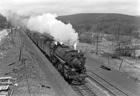 Erie Railroad 2-8-2 steam locomotive no. 3212 pulling an eastbound "pick-up" freight train with 25 cars at Southfields, New York, on May 5, 1946. Photograph by Donald W. Furler, © 2017, Center for Railroad Photography and Art, Furler-10-068-01