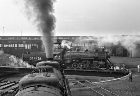 National Railways of Mexico 2-8-2 steam locomotive no. 2117 on turntable at Tlanlnepanthla de Baz, Mexico, Mexico circa 1960. Rose-01-192-11; Photograph by Ted Rose, © 2015, Center for Railroad Photography and Art