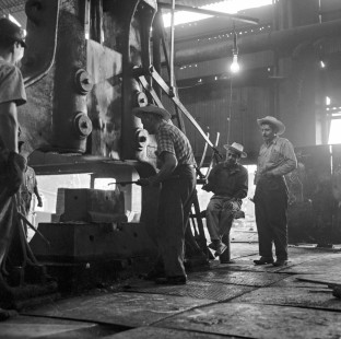 National Railways of Mexico workers in drop hammer foundry at shops in Aguascalientes, Aguascalientes, Mexico, circa 1960. ; Rose-01-067-05; Photograph by Ted Rose,  © 2015, Center for Railroad Photography and Art